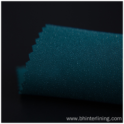 Enzyme washing polyester woven fusible interlining for dress